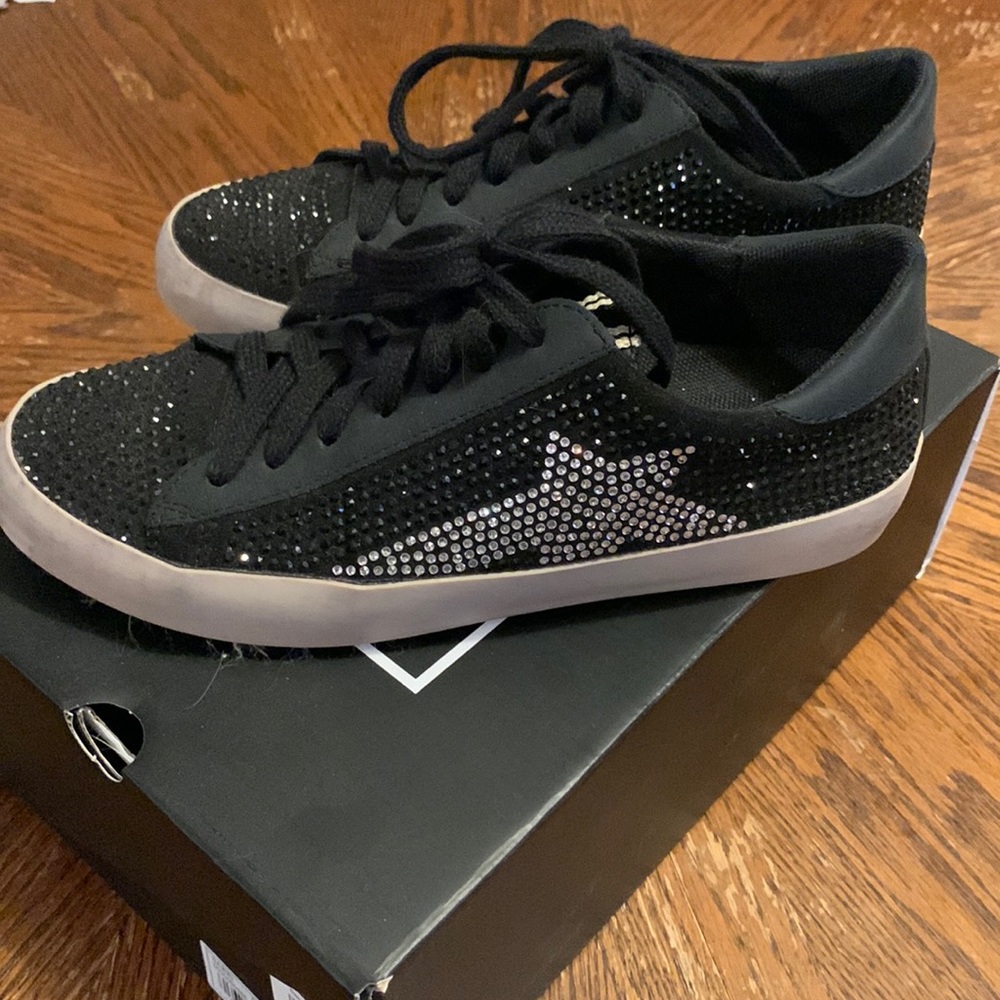 Black star studded shoes